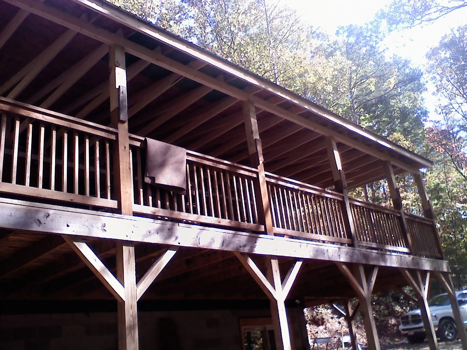 Timber framing under a new elevated porch and deck — Roof Leak Repair in Wimberley by Roofing Brothers